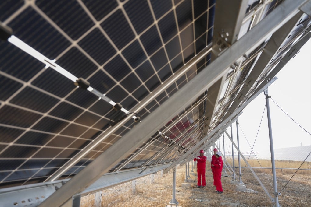 Technicians inspect photovoltaic power generation equipment at the low-carbon demonstration zone of Lamadian Oilfield in Daqing, Heilongjiang province, March 25, 2026. Photo: Xinhua