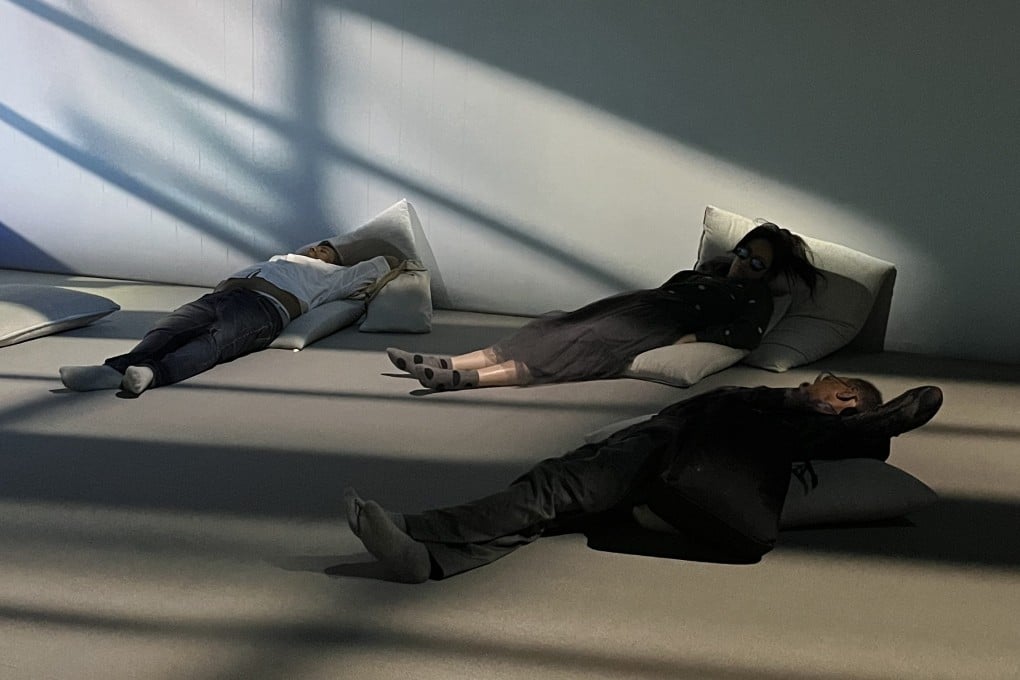 Visitors rest on cushions that form part of artist Kingsley Ng’s Laundry Nocturne installation at the Hong Kong pavilion at the 2026 Venice Biennale. Photo: Enid Tsui