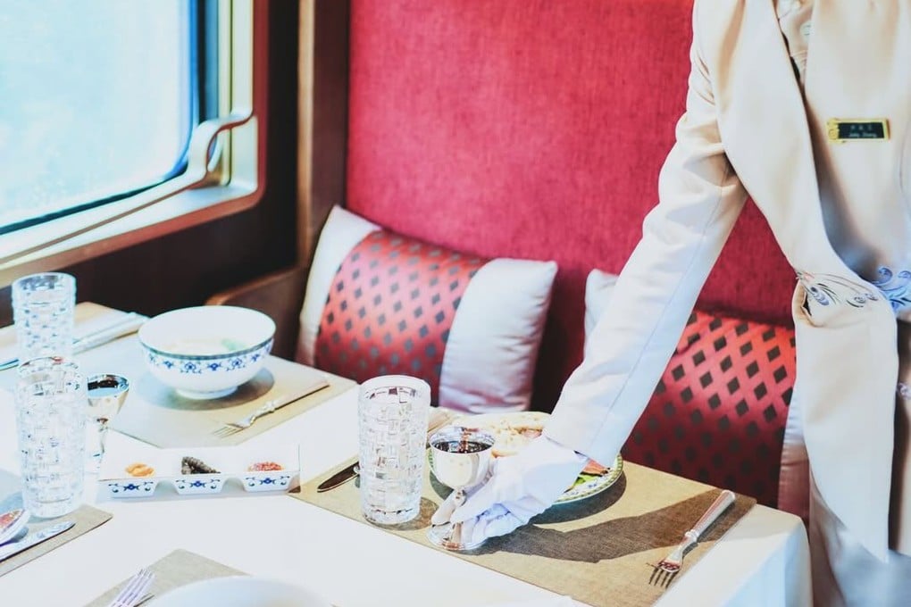 A meal is served aboard the Silk Road Express, a luxury tourist train in China that recently started operating a new route straddling Sichuan and Yunnan provinces. Photo: Courtesy of Train of Glamour
