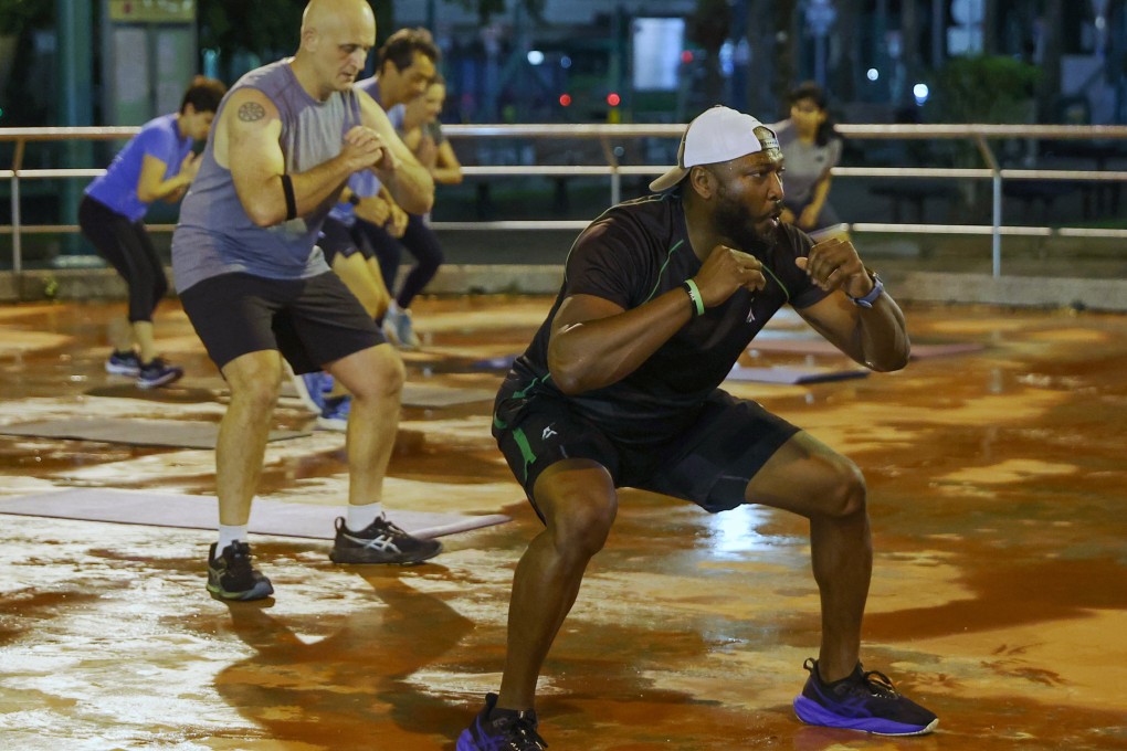 Fitness coach Ash Ayonote leads a group session at the Wai Man Road Playground in Sai Kung, in Hong Kong’s New Territories. Photo: Edmond So