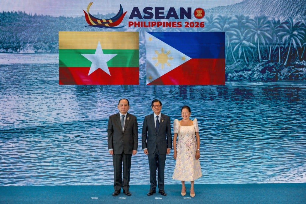 U Hau Khan Sum (left), permanent secretary of Myanmar’s Ministry of Foreign Affairs, poses for a photo with Philippine President Ferdinand Marcos Jnr and his wife at the Asean summit on Cebu on May 8. Photo: EPA