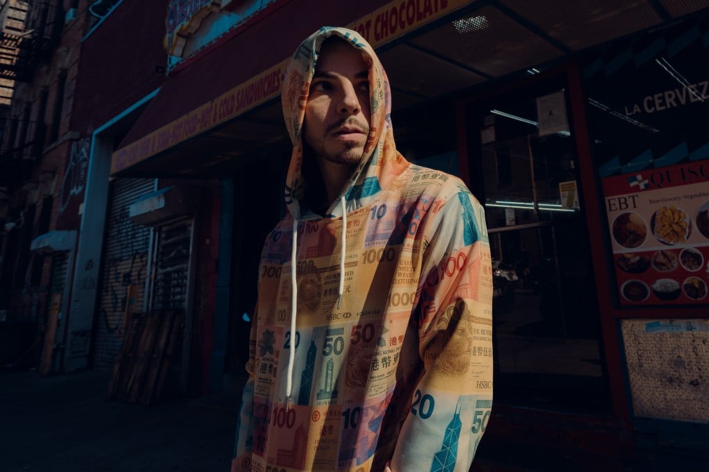 Lucas Scibetta wears a hoodie plastered with images of Hong Kong bank notes, a design from his upcoming clothing collection. The rapper hit viral fame in 2012 with his song “Hong Kong Kids”.  Photo: Pedro Vasquez