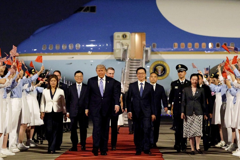 US President Donald Trump (centre left) arrives at Beijing Capital International Airport, where he was greeted by Chinese Vice-President Han Zheng (centre right) on May 13, 2026. Photo: TNS