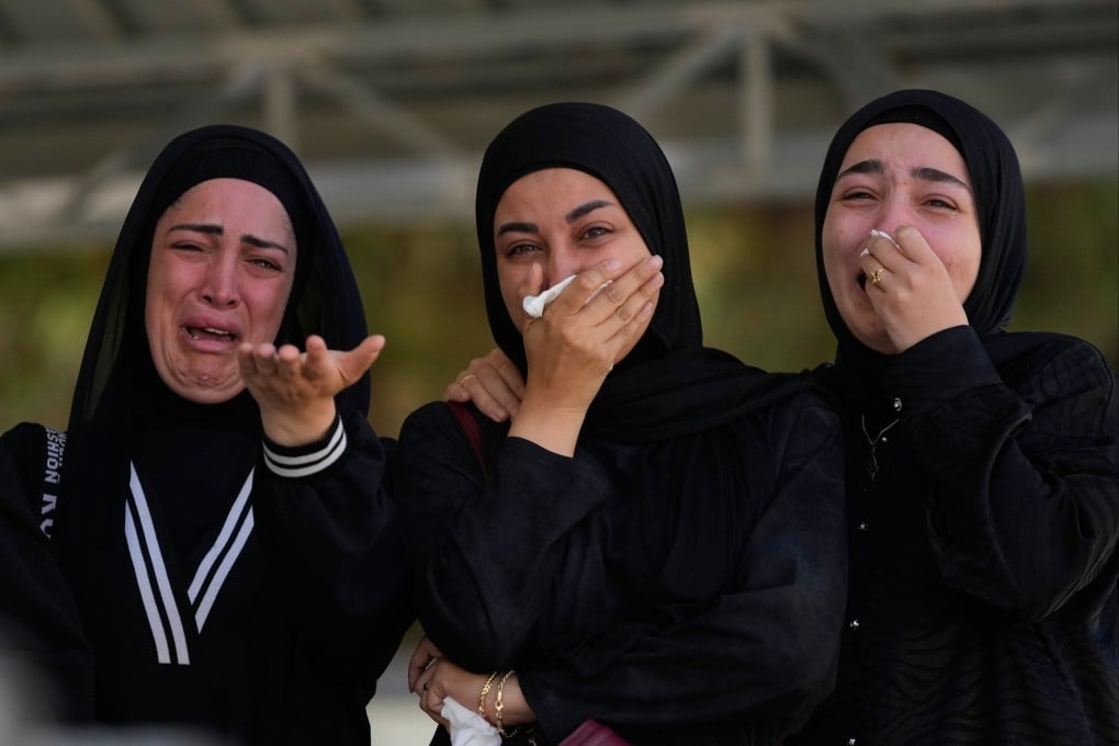 Women grieve during a funeral procession on Sunday for nine people killed in an Israeli strike in the village of Saksakieh, southern Lebanon. Photo: AP