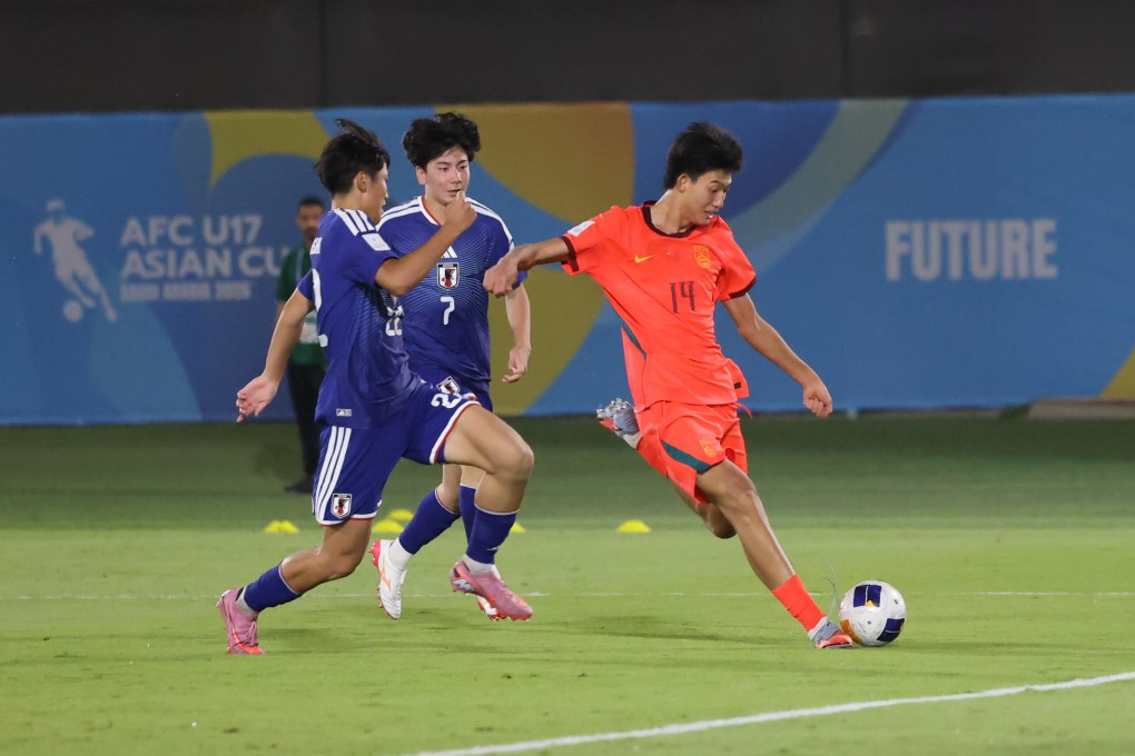 China lost 2-1 defeat to Japan in Jeddah last Saturday, with Zhao Songyuan (right) scoring his team’s goal, but China qualified for the quarter-finals after beating Qatar 2-0 on Tuesday. Photo: Xinhua