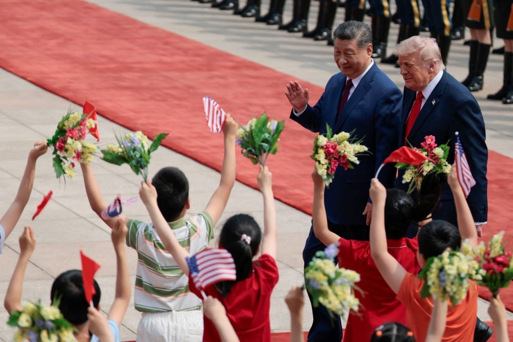 Children greet Chinese President Xi Jinping (second right) and US President Donald Trump during a welcome ceremony at the Great Hall of the People in Beijing on May 14. Photo: Reuters