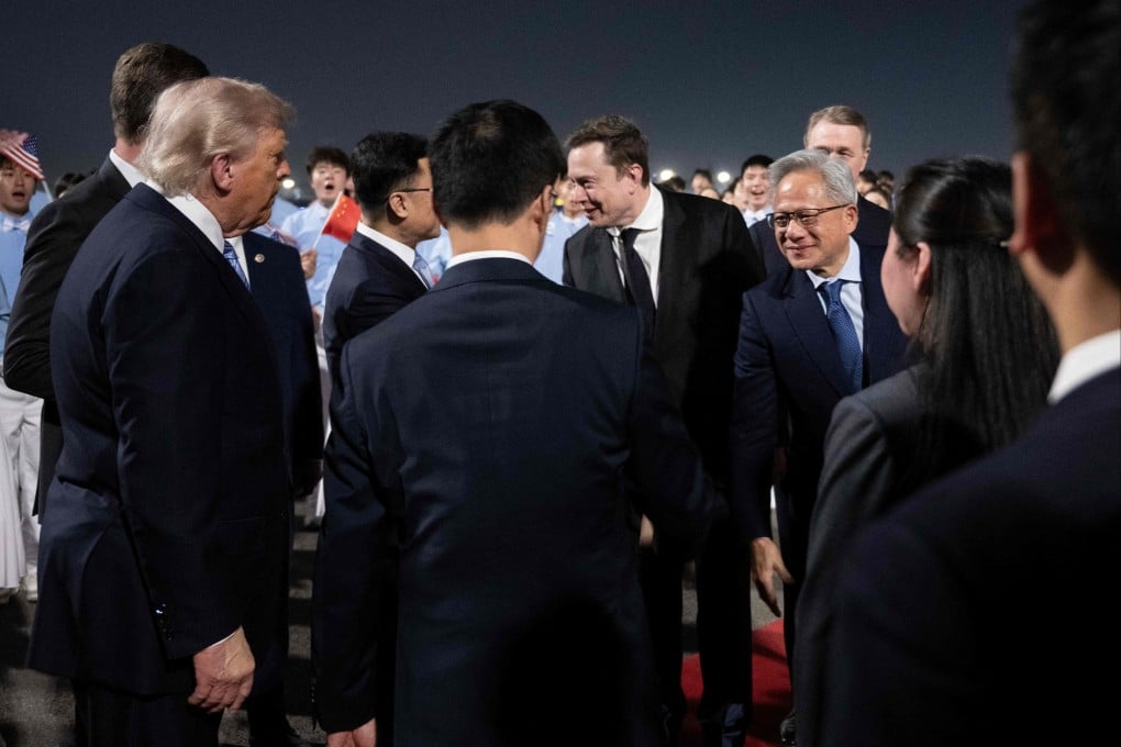 US President Donald Trump watches as members of his delegation including Tesla and SpaceX CEO Elon Musk and Nvidia CEO Jensen Huang are greeted by Vice-President Han Zheng and others after their arrival at Beijing Capital International Airport on Wednesday. Photo: AFP
