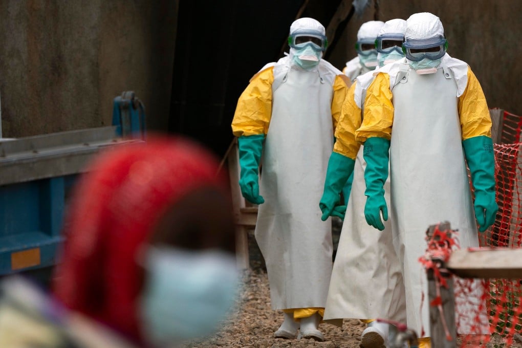 Health workers dressed in protective gear work at an Ebola treatment centre in Beni, Congo, in 2019. File photo: AP
