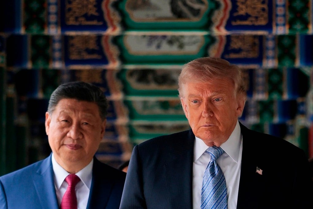 Xi Jinping and Donald Trump take a walk through the garden at Zhongnanhai in Beijing on Friday. Photo: Evan Vucci/Pool Reuters via AP