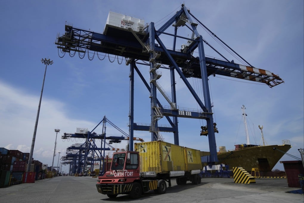 Containers at the Manila North Harbour Port in Manila, Philippines. Development of the Luzon Economic Corridor will involve eight more countries. Photo: AP