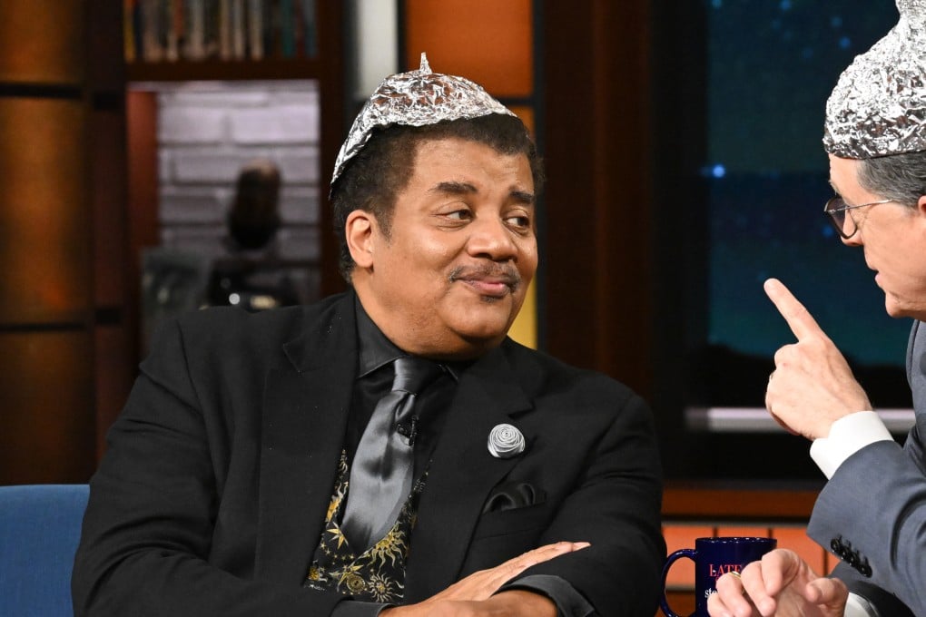 Neil deGrasse Tyson and Stephen Colbert appear on the CBS series The Late Show with Stephen Colbert on April 21, 2026. DeGrasse Tyson’s new book, Take Me To Your Leader, was released in May. Photo: CBS via Getty Images