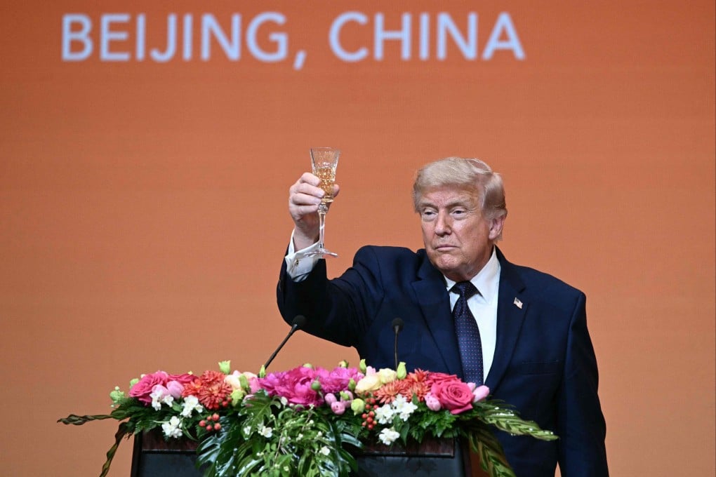 US President Donald Trump makes a toast as he attends Thursday’s state banquet with President Xi Jinping at the Great Hall of the People in Beijing. Photo: AFP