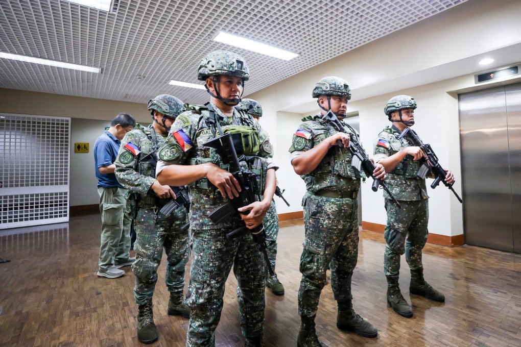 Soldiers stand guard inside the Philippine Senate complex on Wednesday. Photo: Xinhua