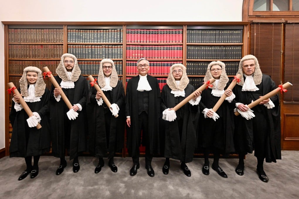 Chief Justice Andrew Cheung (centre) poses with the six newly appointed senior counsel. Photo: Handout
