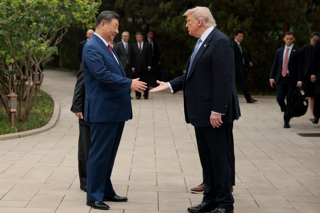 US President Donald Trump bids farewell to Chinese President Xi Jinping as he wraps up his state visit, in Beijing on Friday. Photo: Reuters