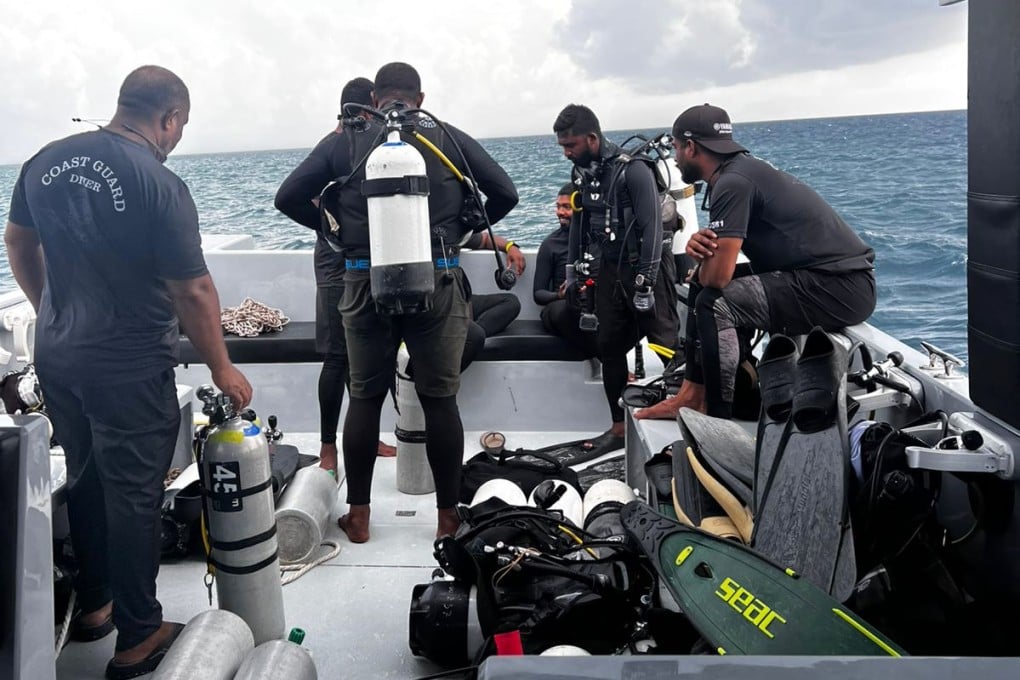 Rescue divers preparing to search for the four missing Italian divers near Alimathaa Island, Vaavu Atoll, Maldives, on Saturday. Photo: AP