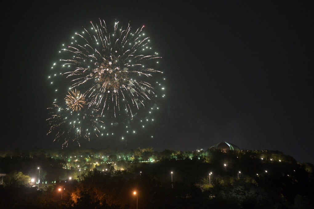 In Islamabad, fireworks light up the sky to mark the first anniversary of Pakistan’s air skirmish with India on May 10. Photo: EPA