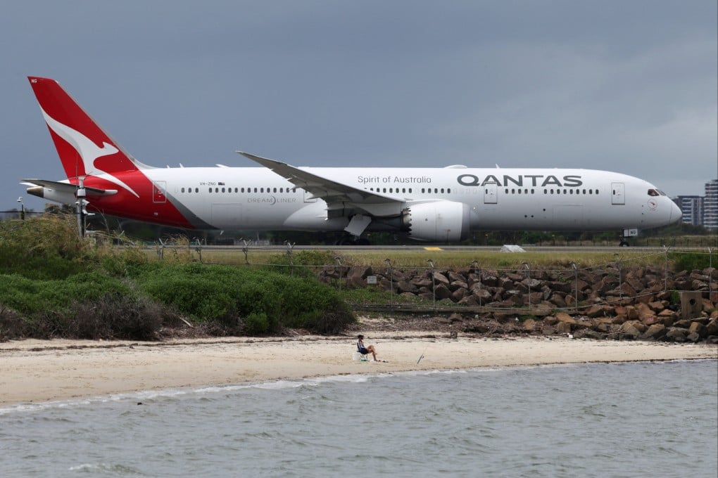 A Qantas plane taxis along a runway at Sydney Airport in February. Photo: Reuters