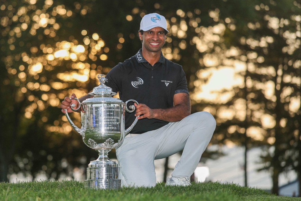 Aaron Rai of England with The Wanamaker Trophy after winning the 2026 PGA Championship at Aronimink Golf Club on Sunday in Newtown, Pennsylvania. Photo: AFP