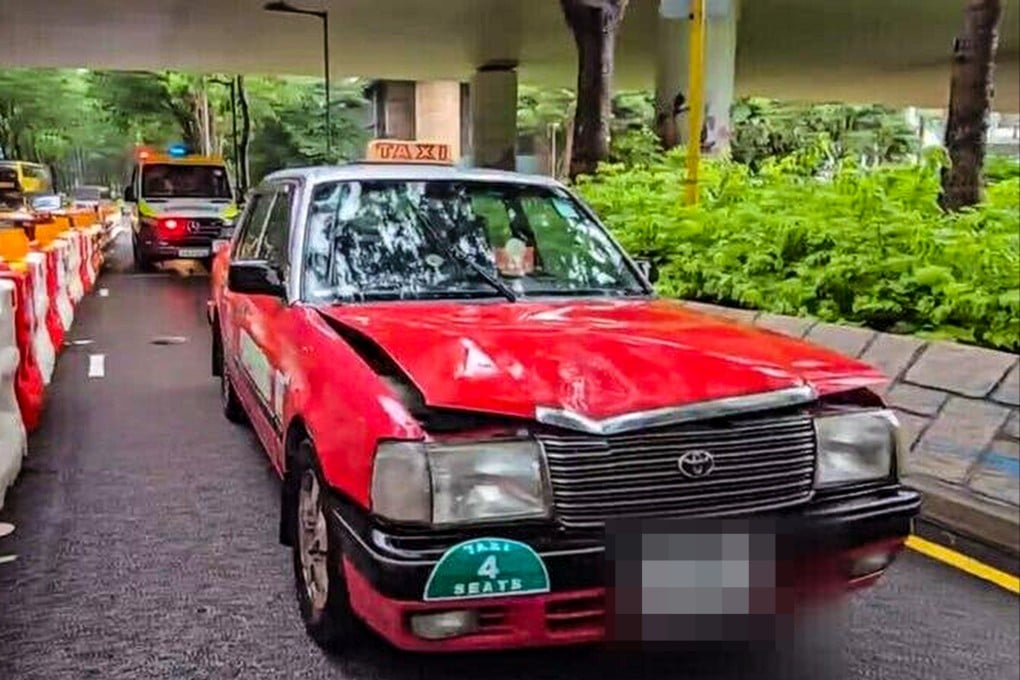 A man has died after being struck and trapped beneath a taxi in Tung Chung. Photo: Cable TV News