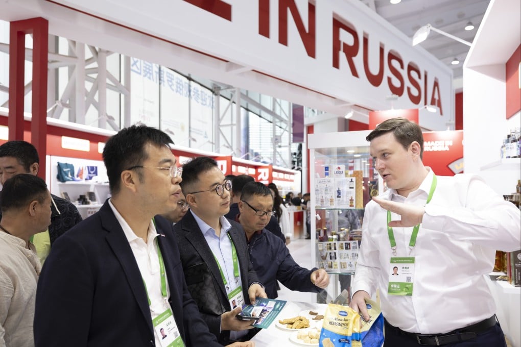 Attendees learn about Russian food products at the 10th China-Russia Expo in Harbin, northeastern China’s Heilongjiang province, on Saturday. Photo: Xinhua