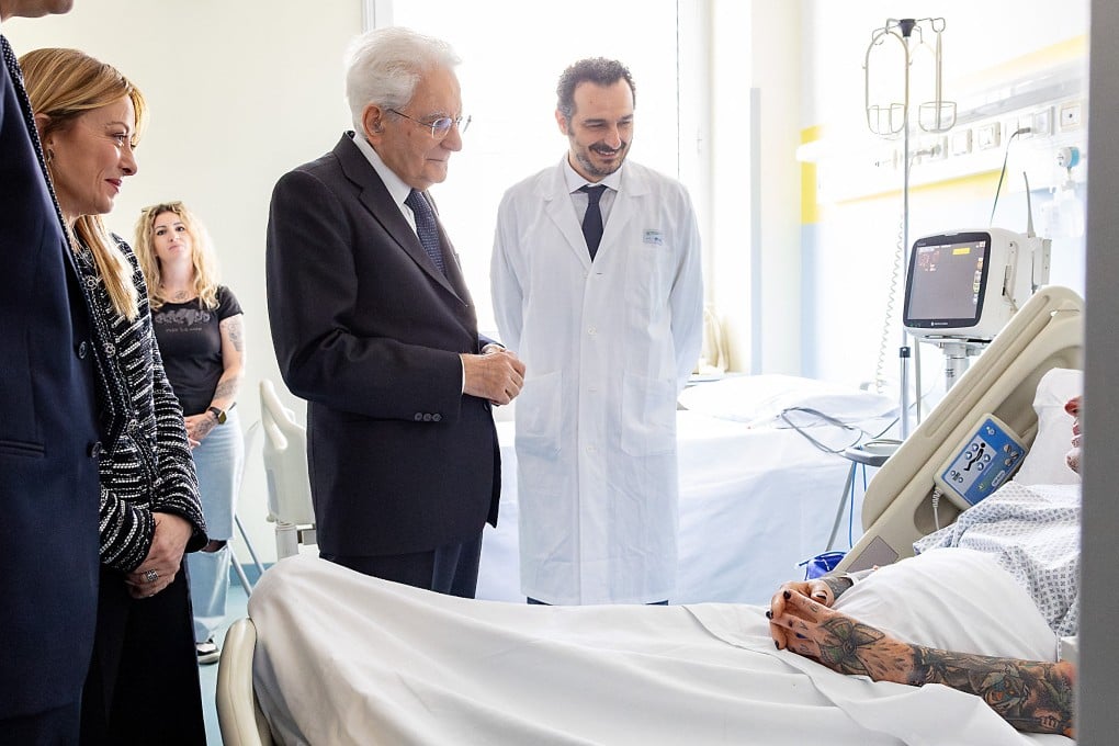 Prime Minister Giorgia Meloni and President Sergio Mattarella during a visit with an injured victim. Photo: Quirinale Press Office via AFP