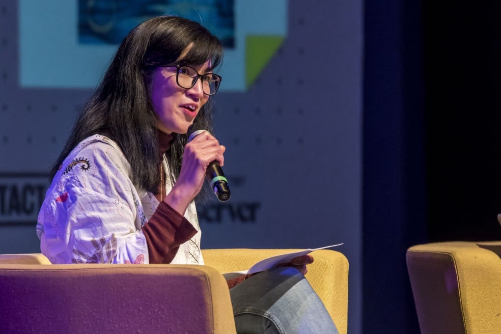 Eliza Chan speaking at the Manchester Literature Festival in 2025. The writer, who grew up in Scotland, went from rejecting her Chinese heritage to embracing it. Photo: Chris Payne