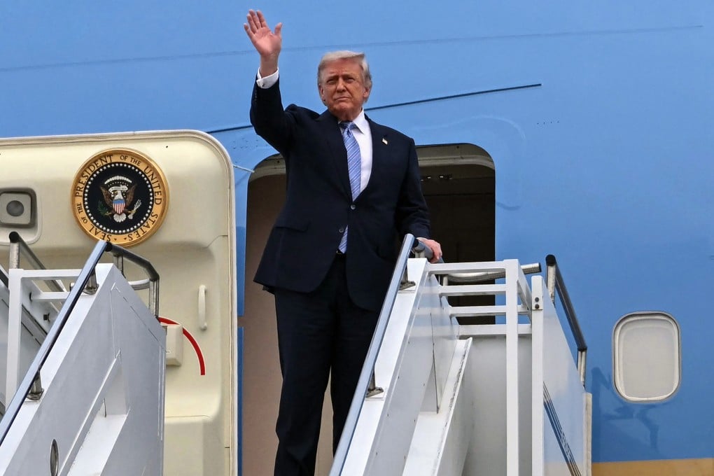 US President Donald Trump boards Air Force One before departing Beijing on Friday. Photo: AFP/Getty Images/TNS