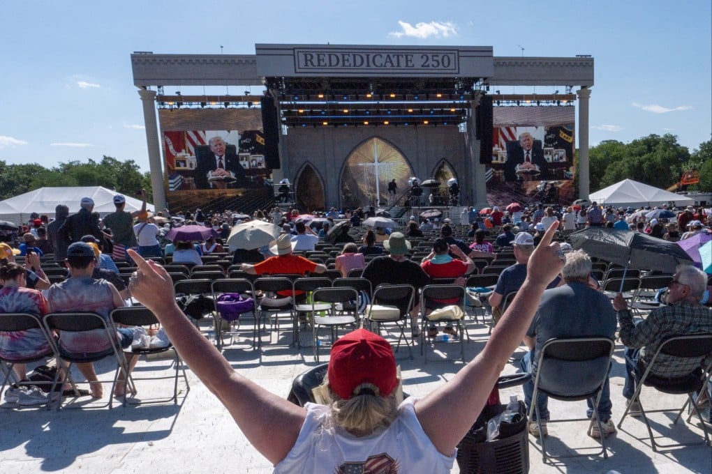 People watch a recorded video message from President Donald Trump. Photo: AP