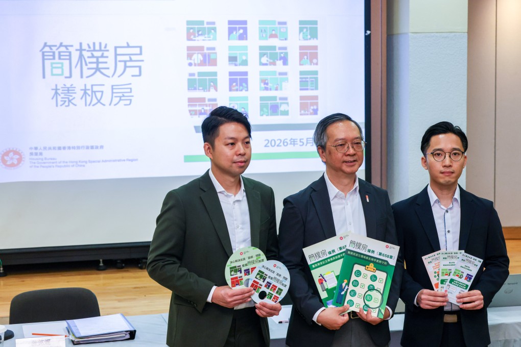 Undersecretary for Housing Victor Tai (centre) with principal assistant secretary for housing Jason Chan (left) and Thomas Lo, the Housing Bureau's maintenance surveyor for subdivided flats, at a press briefing. Photo: Nora Tam
