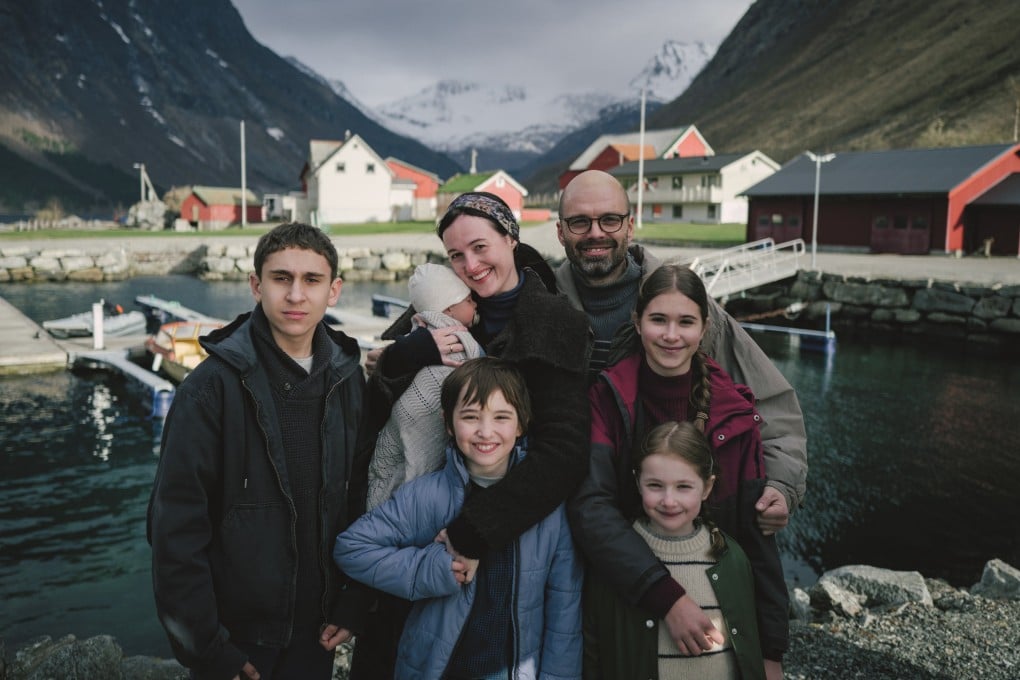 Renate Reinsve and Sebastian Stan play a married couple with five children in the film Fjord, directed by Cristian Mungiu. Jonathan Ciprian Breazu (far left) and Vanessa Ceban (right) co-star.