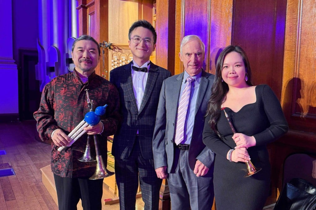 Organist Eric Chan (second left) and suona players Guo Yazhi (left) and Chrysoberyl Chan (right) are joined by Kerry Stevens, chairman of the Auckland Town Hall Organ, before a performance at the New Zealand venue under Chan’s “Pipe Organ Through East and West” programme in May 2026. Photo: courtesy of Eric Chan