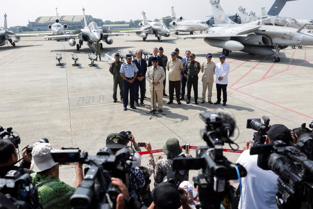 Indonesia’s President Prabowo Subianto speaks to members of the media after inaugurating military aircraft at the Halim Perdanakusuma air base in Jakarta on Monday. Photo: Reuters