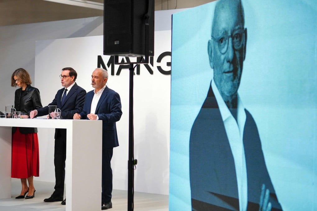 Isak Andic’s image is projected on the wall as Mango chiefs announce its 2024 financial results on March 10, 2025. Photo: AFP