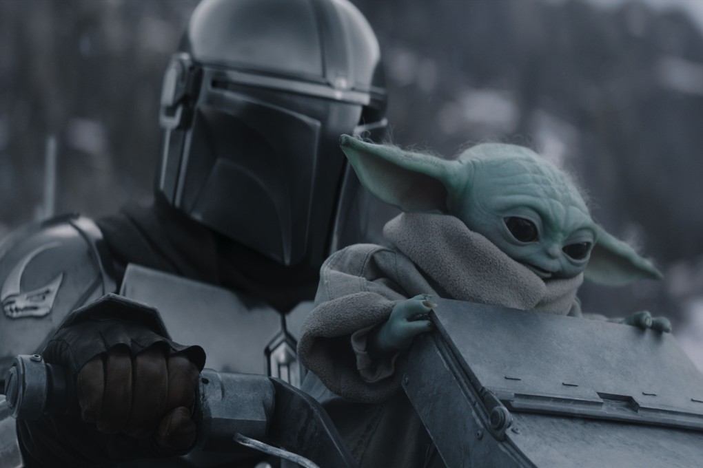 The Mandalorian (left, played by Pedro Pascal) and Grogu in a still from Star Wars: The Mandalorian and Grogu (category IIA), directed by Jon Favreau. Sigourney Weaver and Jeremy Allen White co-star. Photo: Lucasfilm Ltd