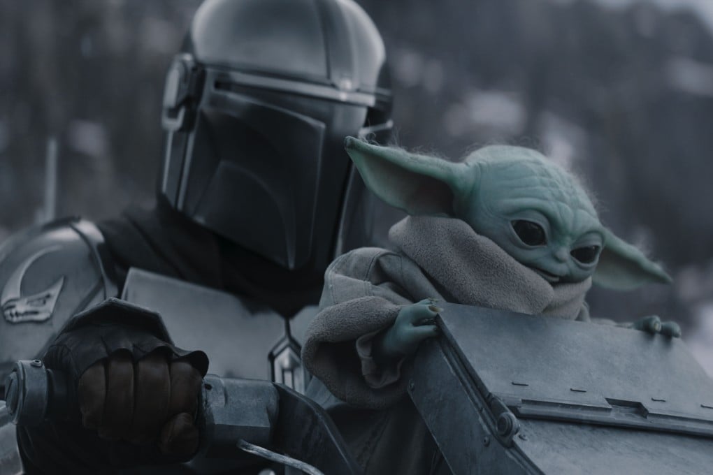 The Mandalorian (left, played by Pedro Pascal) and Grogu in a still from Star Wars: The Mandalorian and Grogu (category IIA), directed by Jon Favreau. Sigourney Weaver and Jeremy Allen White co-star. Photo: Lucasfilm Ltd