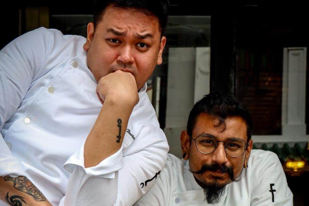 Employees Only Singapore bar manager William Melo Camcam (left) and bartender Darren Prasad. Photo: Handout