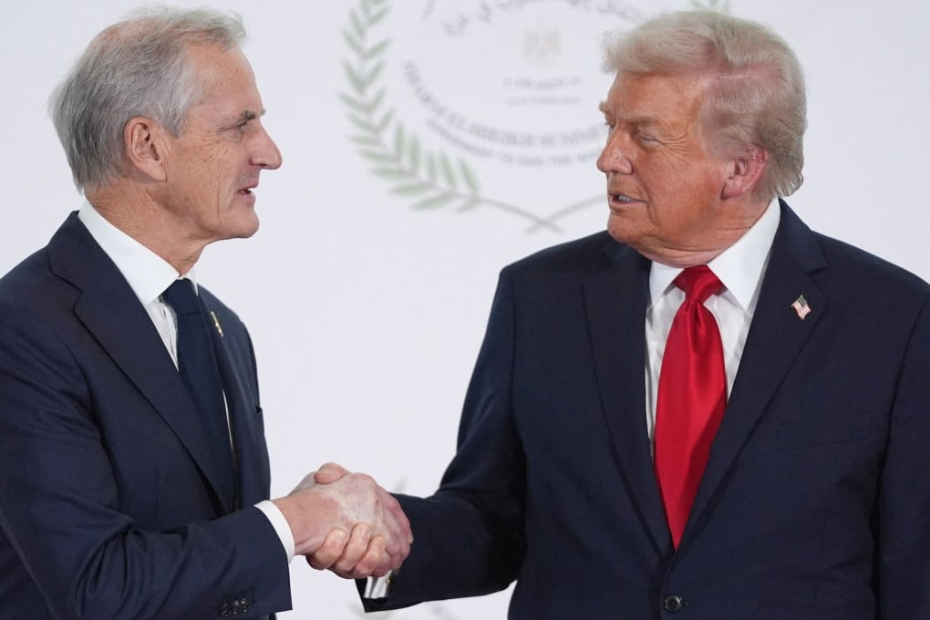 US President Donald Trump speaks to Norway’s Prime Minister Jonas Gahr Store at a peace summit on Gaza in Sharm El-Sheikh, Egypt, in October last year. Photo: AFP