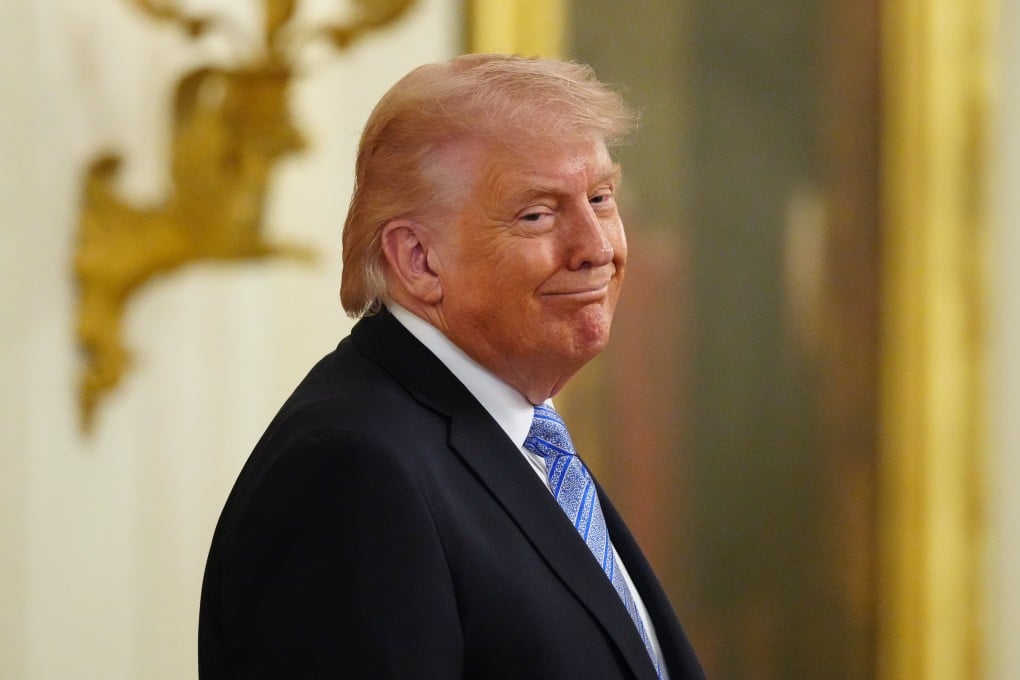 US President Donald Trump smiles as he attends an event with small business owners at the White House on May 4. Photo: AP