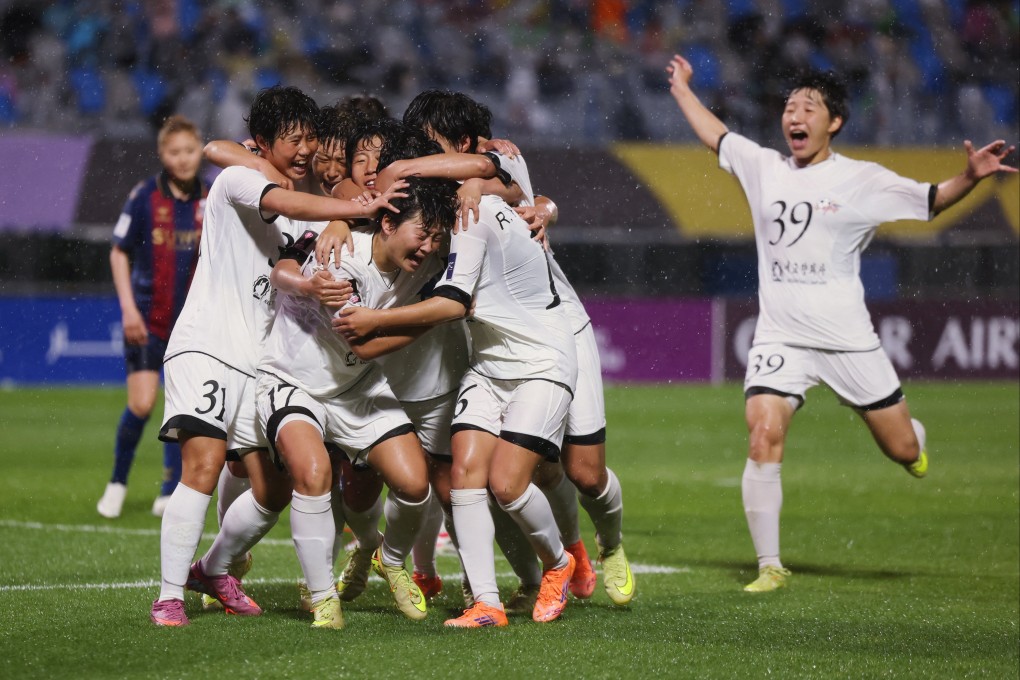 Naegohyang FC’s Kim Kyong-yong is mobbed by her teammates after scoring their second goal in the 2-1 win. Photo: Reuters