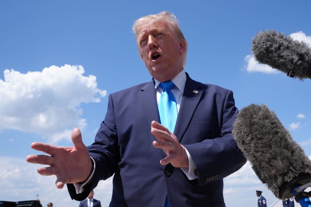 US President Donald Trump speaks to the press after stepping off Air Force One, at Joint Base Andrews, Maryland, on Wednesday. Photo: AP