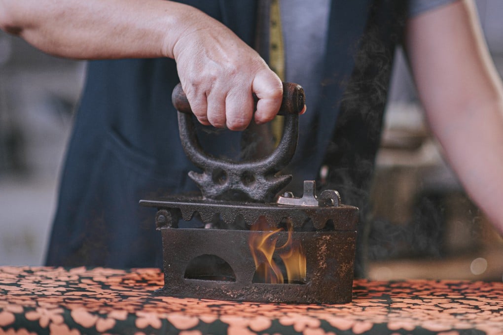 Early Chinese irons used heated charcoal placed inside a bronze or iron container with a flat base. Photo: Getty Images