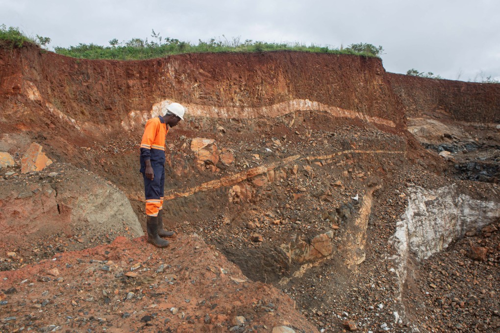 A worker inspects an open cast at the Arcadia lithium mine in Goromonzi, Zimbabwe. Photo: Getty Images