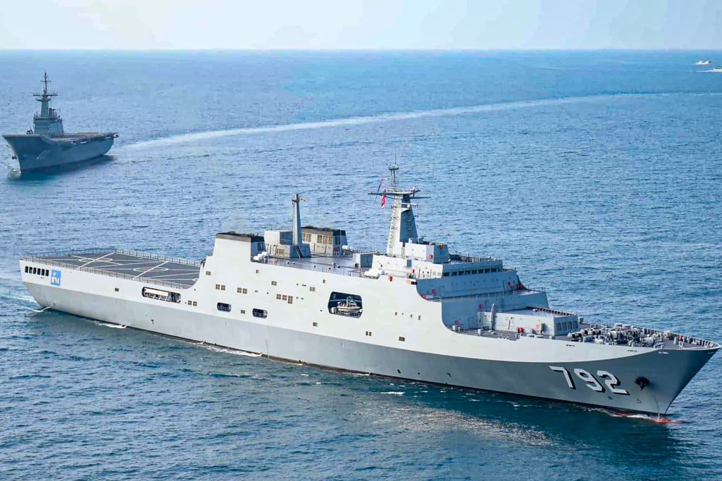 Thai aircraft carrier HTMS Chakri Naruebet (rear) accompanies transport ship HTMS Chang (front) before entering a naval base. Photo: Royal Thai Navy