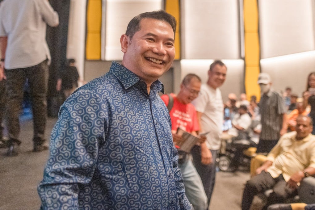 Rafizi Ramli greets attendees after announcing a takeover of Bersama on Sunday. Photo: X/Rafizi Ramli
