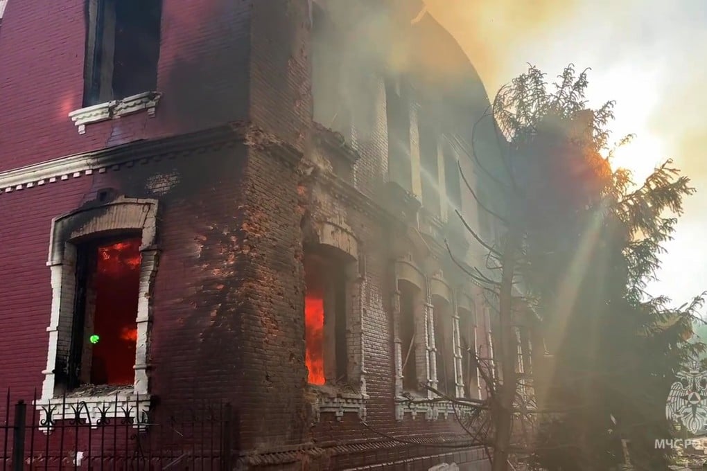 Flames and smoke rise from the side of a college building in Starobilsk, Ukraine. Photo: Russian Emergency Ministry Press Service via AP