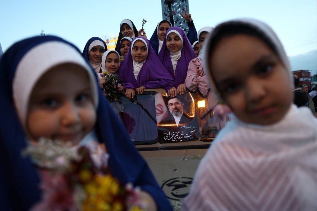 Children on a military vehicle during a public wedding ceremony in Tehran, Iran, on Monday. Photo: via Reuters