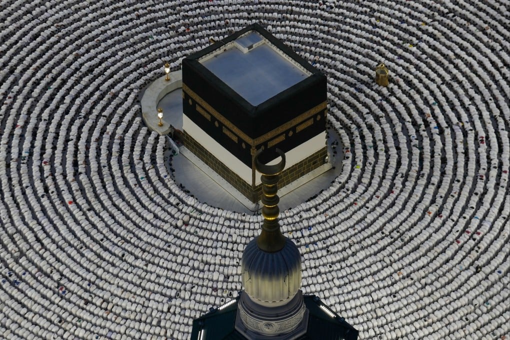 Pilgrims pray around the cube-shaped Kaaba in the Grand Mosque. Photo: AP