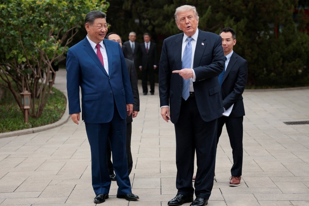 US President Donald Trump gestures towards Chinese President Xi Jinping while leaving after a visit to the Zhongnanhai Garden in Beijing, China, on May 15. Photo: Reuters