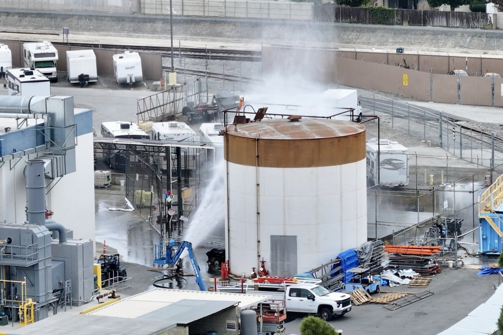 Water is sprayed on a tank that overheated at GKN Aerospace in Garden Grove, California on Friday. On Sunday, officials said a possible crack may help prevent an explosion. Photo: Orange County Register / TNS